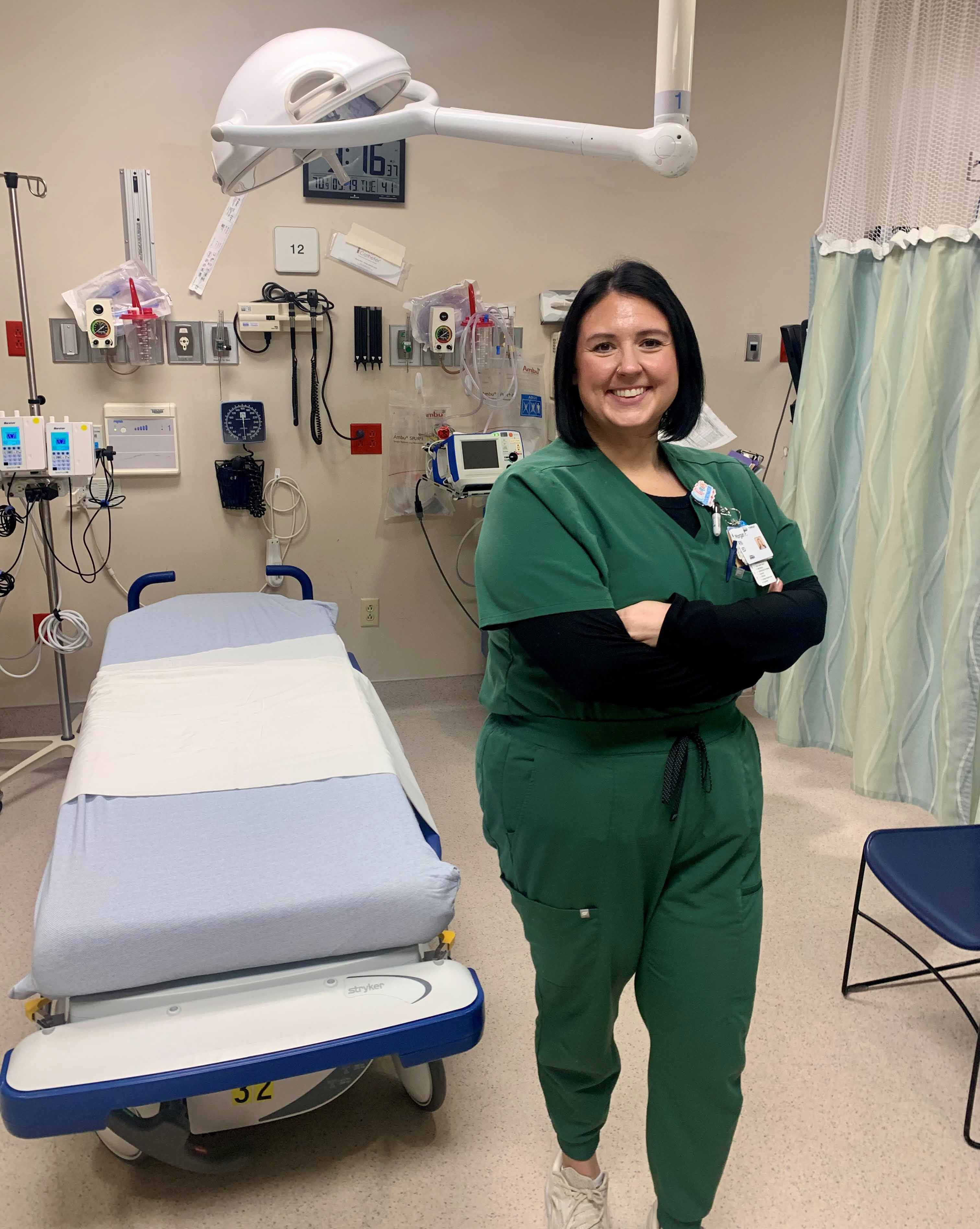 Morgan Faulkner stands in one of the trauma rooms at NNRH.