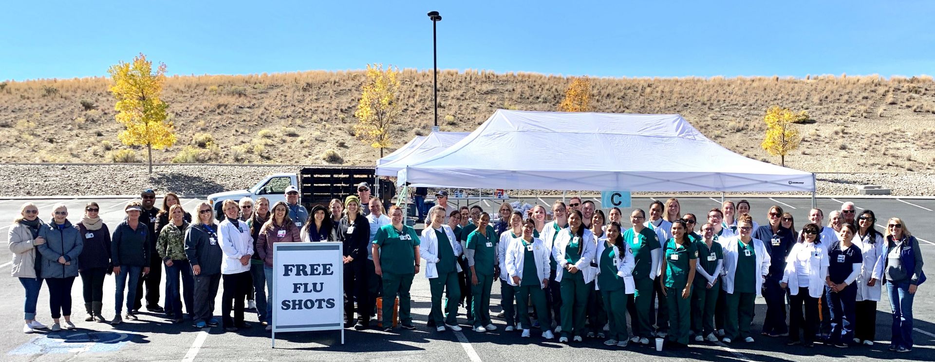 Staff and volunteers from NNRH, along with nursing students from GBC, pose at the annual Drive-Thru Flu Shot Clinic on Saturday.