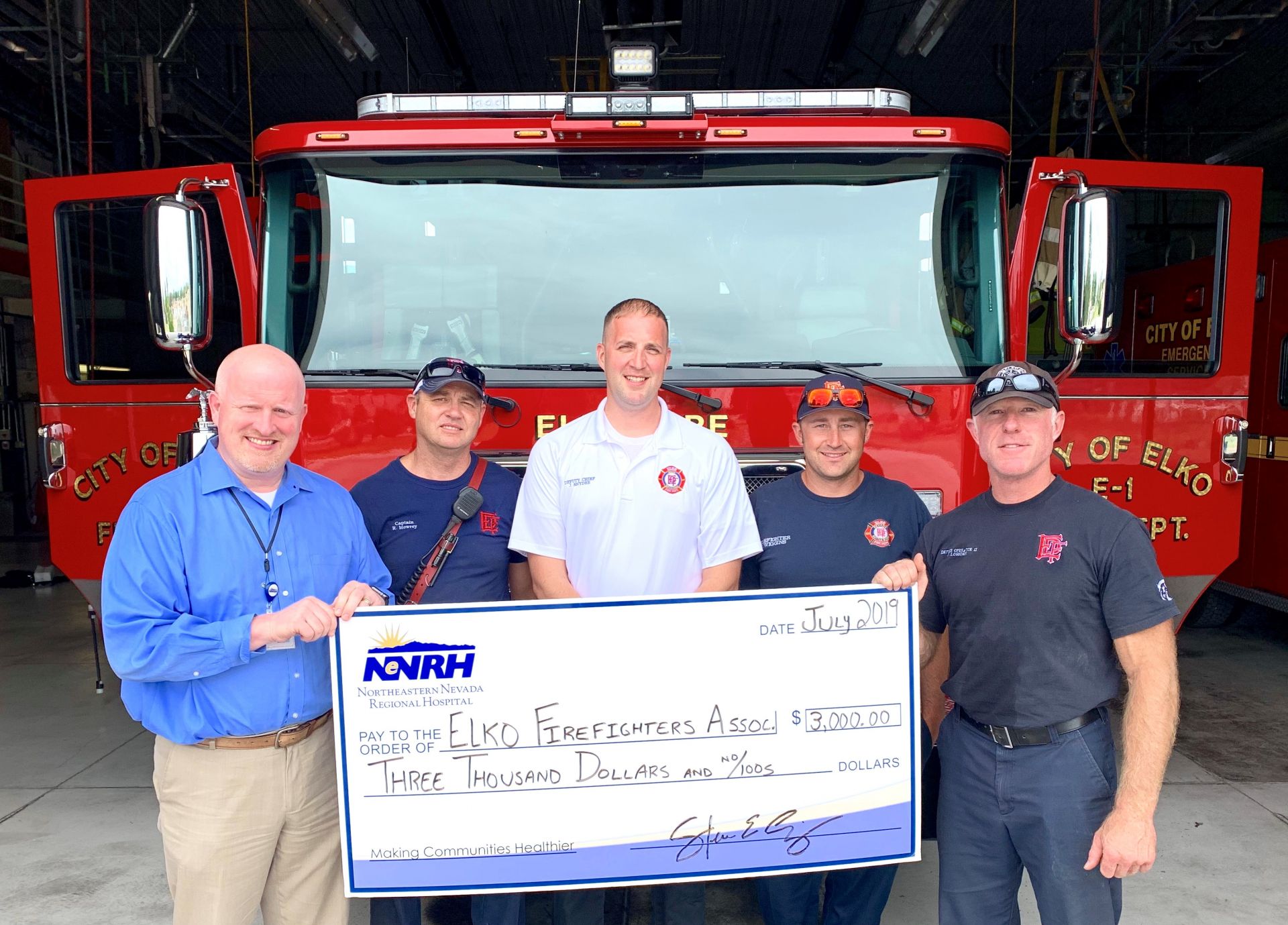 Hospital CEO Steve Simpson (far left) presents a $3,000 donation to members of the Elko Fire Department. Firefighters pictured from left are: Captain Ray Mowrey, Deputy Fire Chief Jack Snyder, Firefighter David Wiggins, and Driver/Operator II Jason Logsden.
